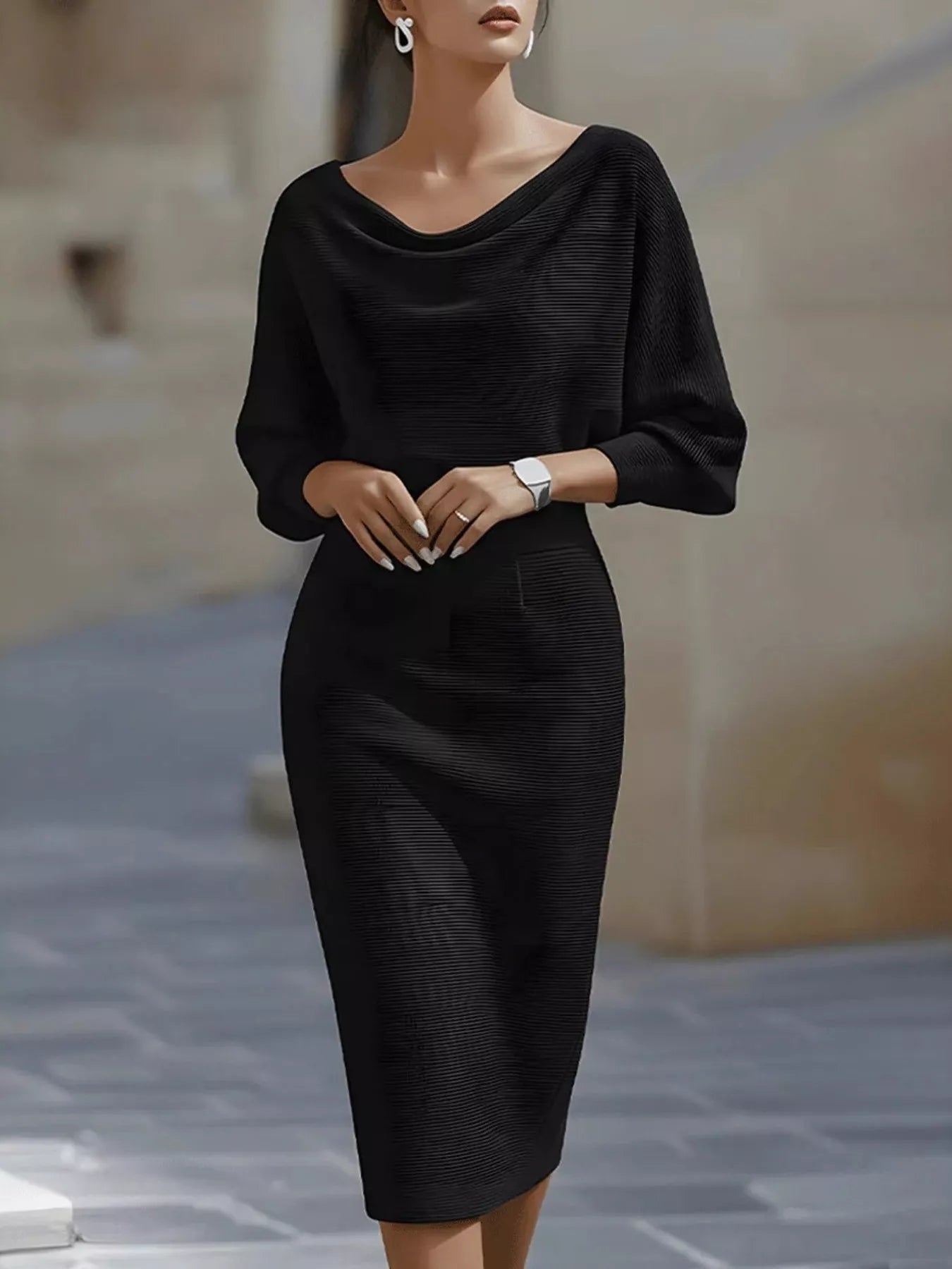 Front view of a black cowl neck knit bodycon dress with wide batwing sleeves