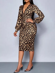 Front view of leopard print bodycon midi dress with hand on hip and long sleeves