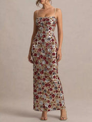 Multicolor floral sequin bodycon maxi dress worn full length facing forward in a studio