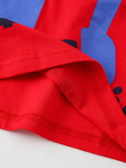 Close up of the red hem stitching and the edge of the blue excavator graphic