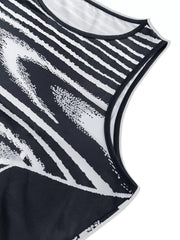 Close view of the neckline and armhole on a black and white sleeveless bodycon maxi dress