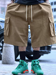 Men's khaki cargo shorts with a drawstring waist and pockets.