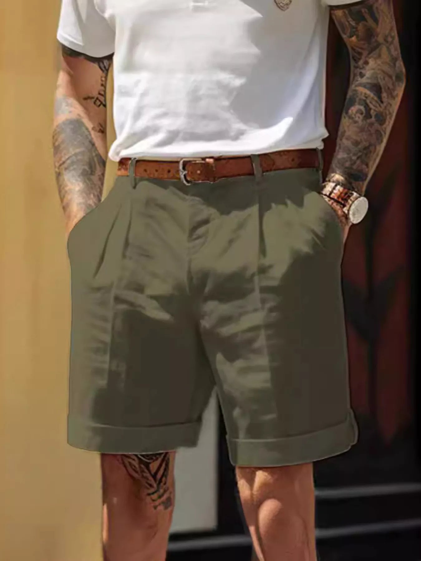 Men's army green classic pleated shorts with pockets, available in plus sizes.
