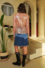 Top de malla de manga larga con cuello alto y lentejuelas de Davi & Dani