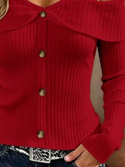 Close up of red cold shoulder ribbed knit top bodice showing ribbing and front buttons