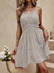 Women's gray floral mini cami dress with a V-neckline.