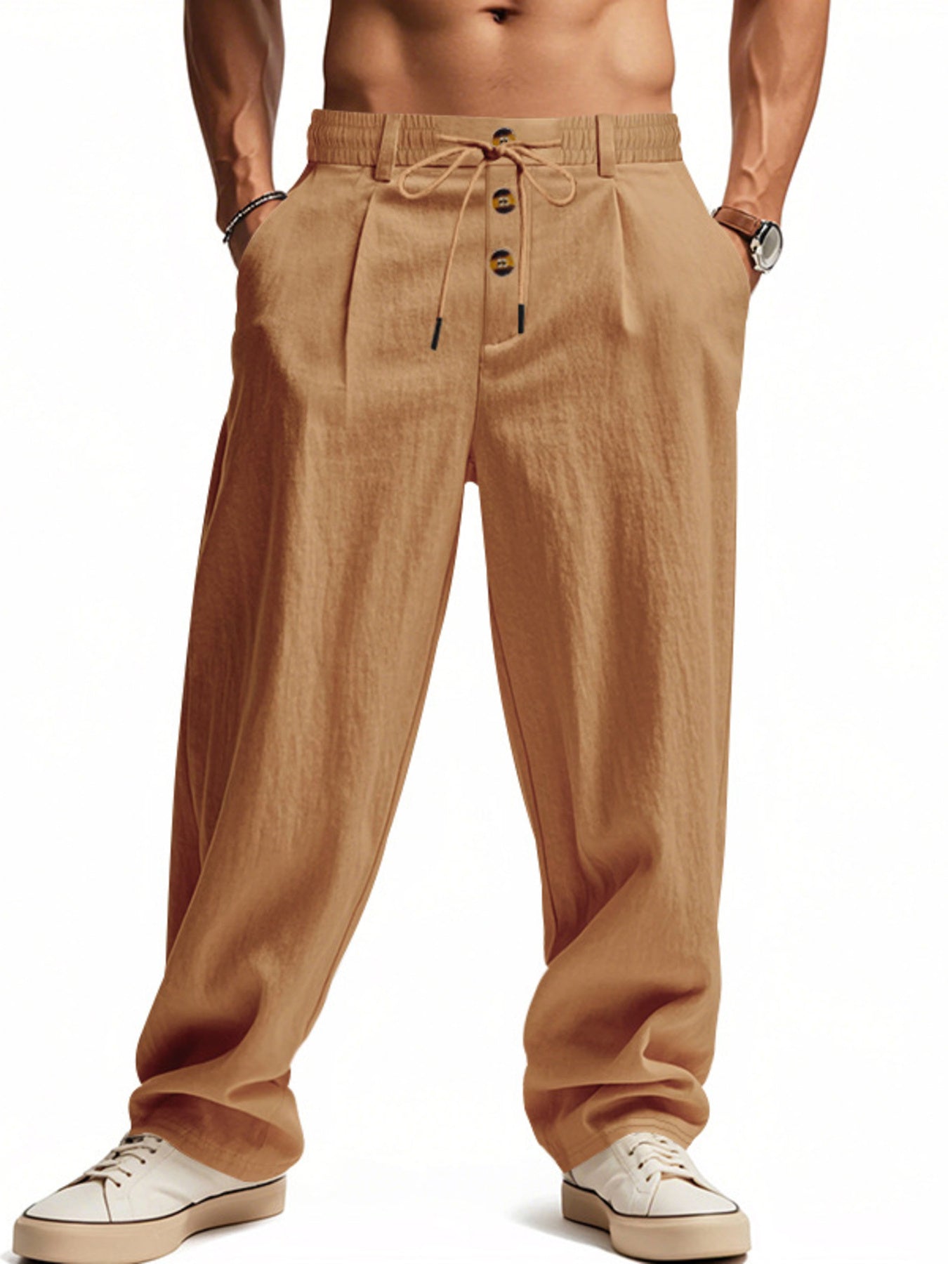 Men's earthy yellow loose-fit pants with a drawstring waist and pockets.