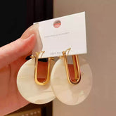 Gold Tone U-Hook Earrings with Shimmering Iridescent Round Disc