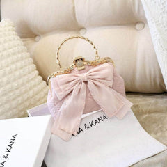 Large Bow Detailed Shimmery Top Handle Purse