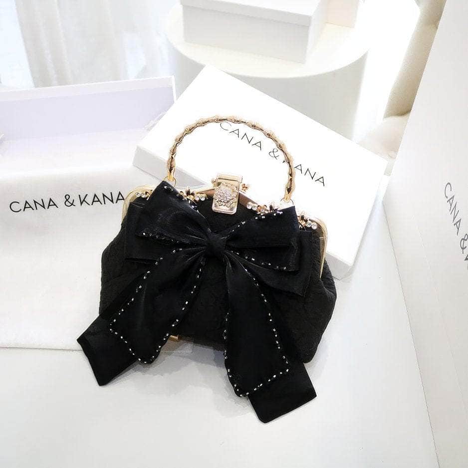 Large Bow Detailed Shimmery Top Handle Purse