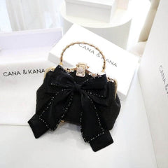 Large Bow Detailed Shimmery Top Handle Purse