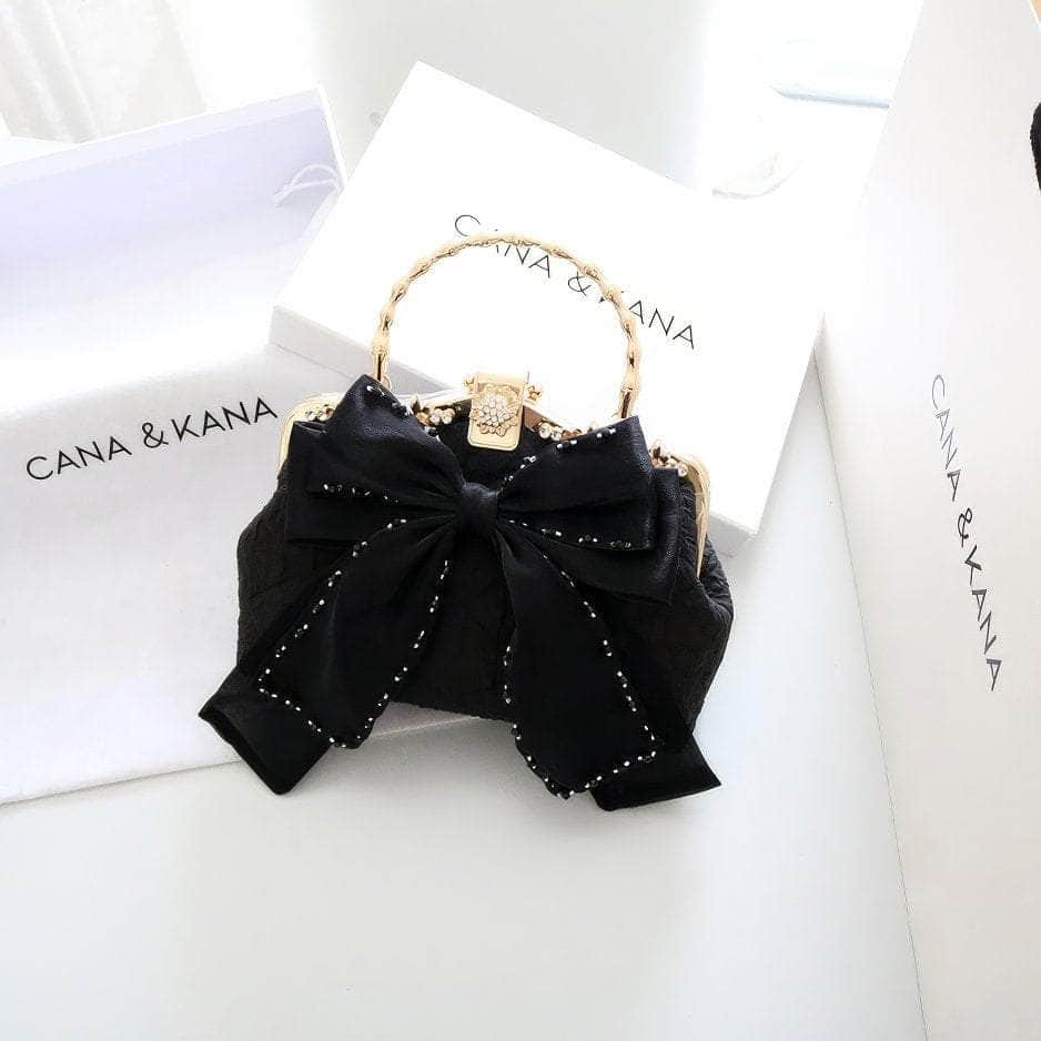 Large Bow Detailed Shimmery Top Handle Purse