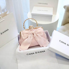 Large Bow Detailed Shimmery Top Handle Purse