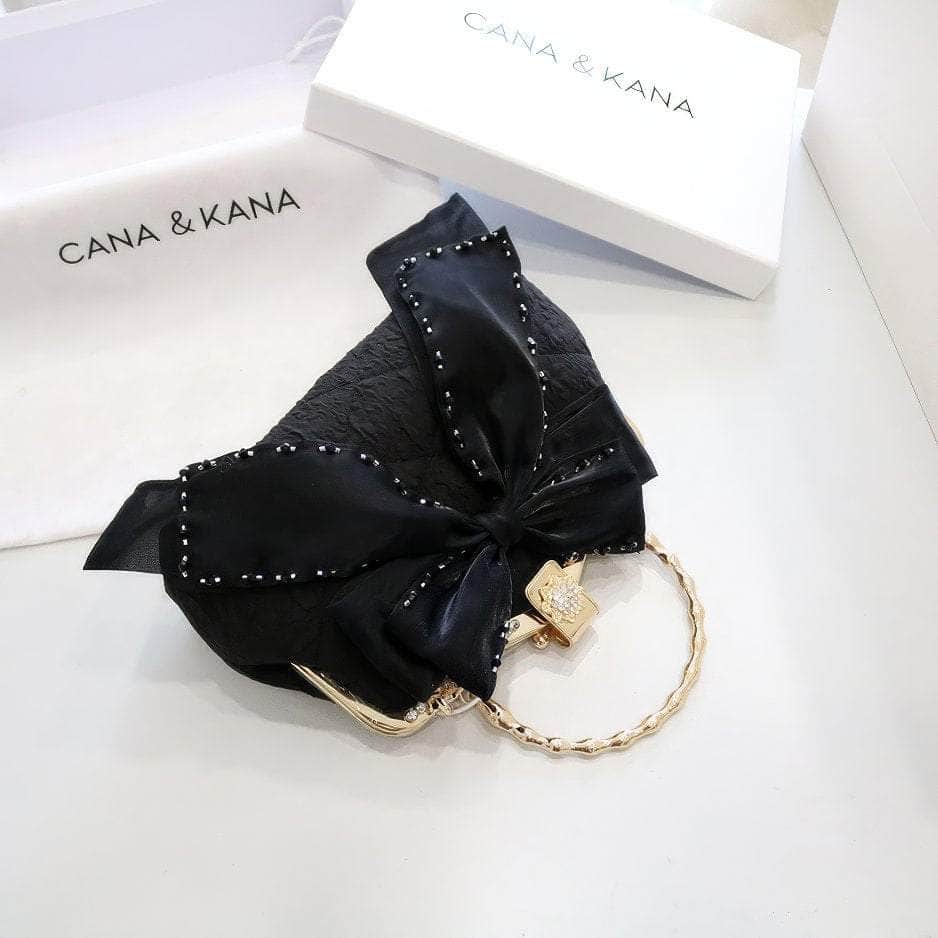 Large Bow Detailed Shimmery Top Handle Purse