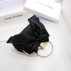 Large Bow Detailed Shimmery Top Handle Purse