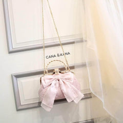 Large Bow Detailed Shimmery Top Handle Purse