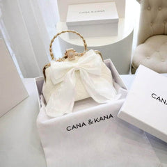 Large Bow Detailed Shimmery Top Handle Purse FloralWhite