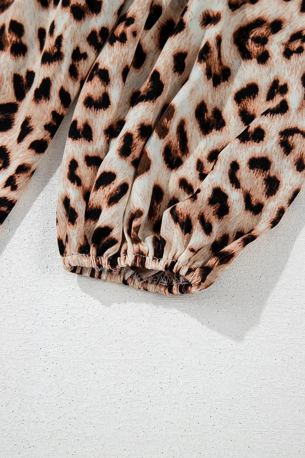 Leopard Print V-Neck Blouse with Contrast Trim