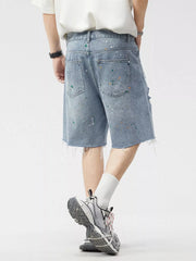 Men's Distressed Paint Splatter Denim Shorts