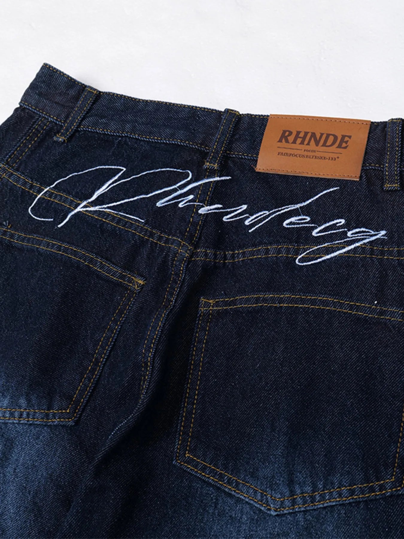 Men's Wide Leg Wash Denim Jeans with Signature Detail