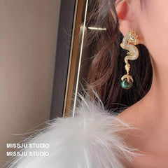 Paved Crystal Dragon Shaped Pearl Deco Earrings White