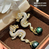 Paved Crystal Dragon Shaped Pearl Deco Earrings White