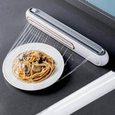 Refillable magnetic plastic wrap dispenser with cutter: for foil and film in the kitchen