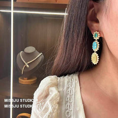Shimmery Tiered Oval Drop Gold Dangle Earrings