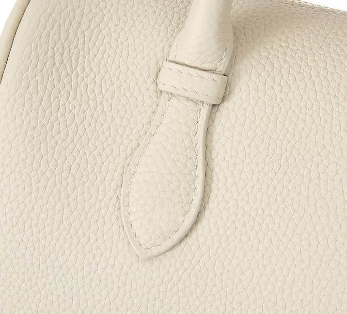 Small Off-White Top Handle Bag with Unique Gold Tone Hand Sculptures