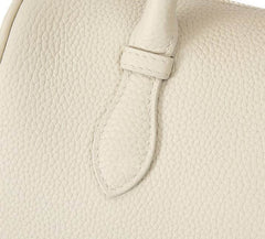 Small Off-White Top Handle Bag with Unique Gold Tone Hand Sculptures