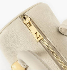 Small Off-White Top Handle Bag with Unique Gold Tone Hand Sculptures
