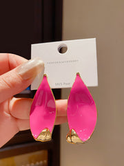 Stylish Gold Tone Abstract Leaf Drop Earrings with Vibrant Hot Pink Enamel Inlay