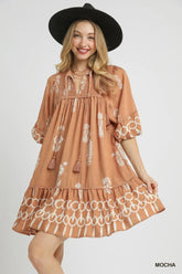 Umgee Boarder Print Tassel Tie Neck Mini Dress Mocha / S