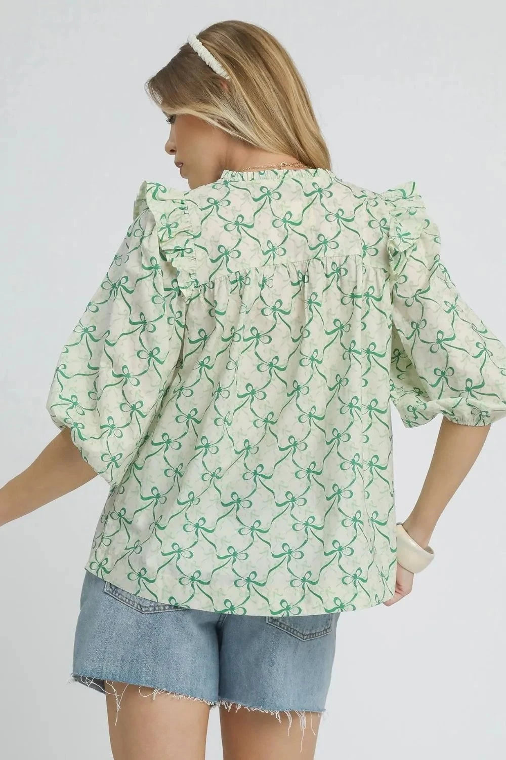 Umgee Ruffled Bow Print Notched Blouse