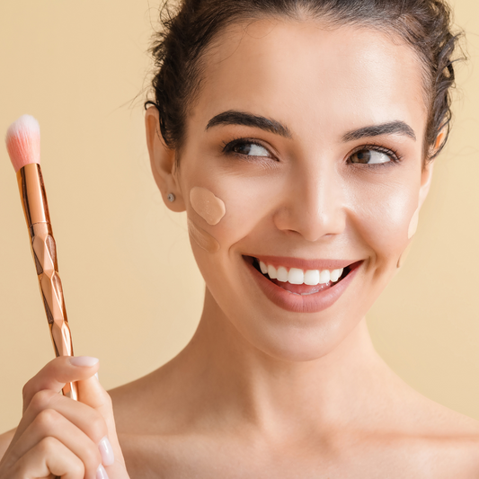 Young Woman with concealer on Face