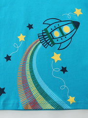 Close-up of the rocket graphic with a striped rainbow trail and yellow and navy stars