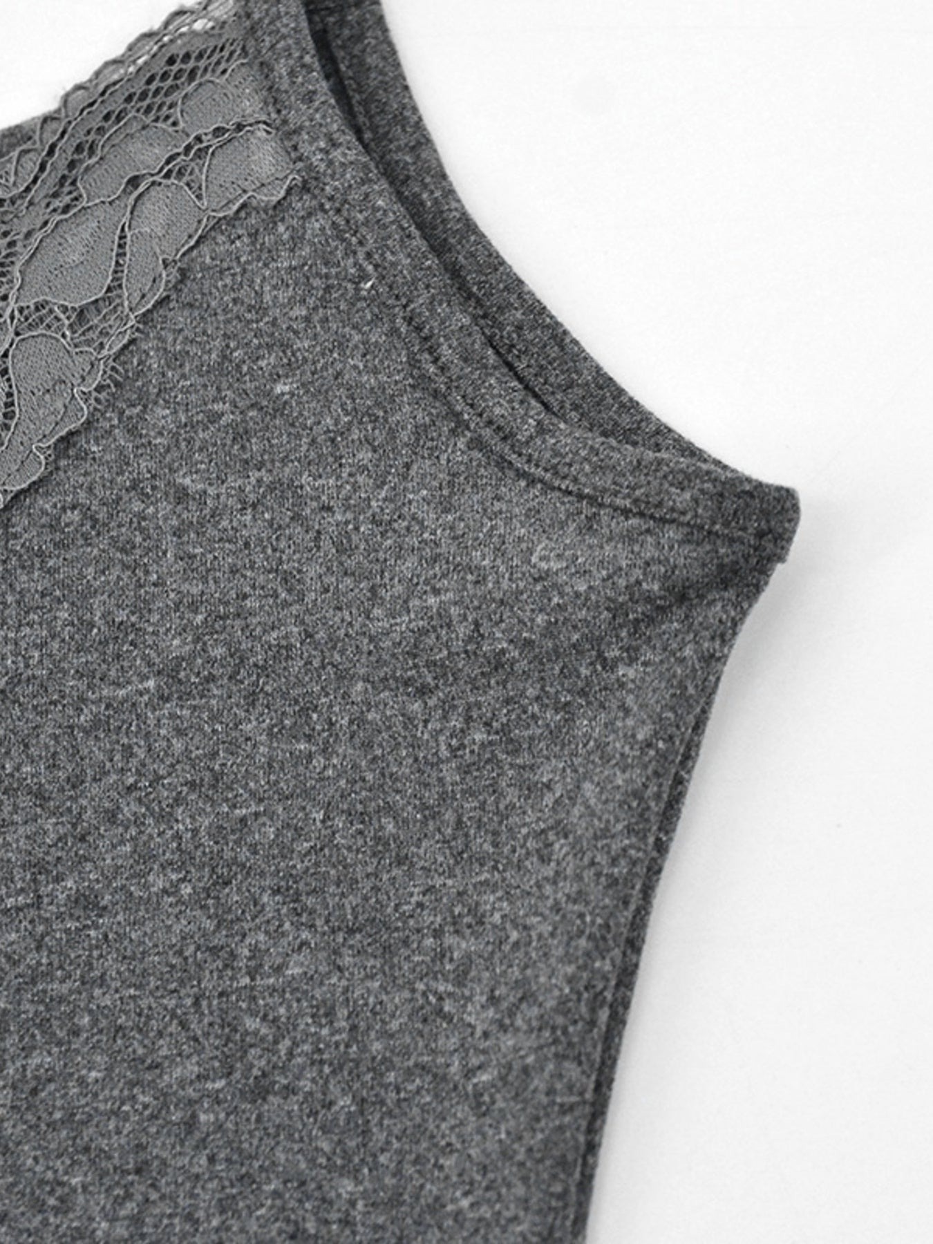 Close view of grey lace trim and side seam on the bodycon mini dress