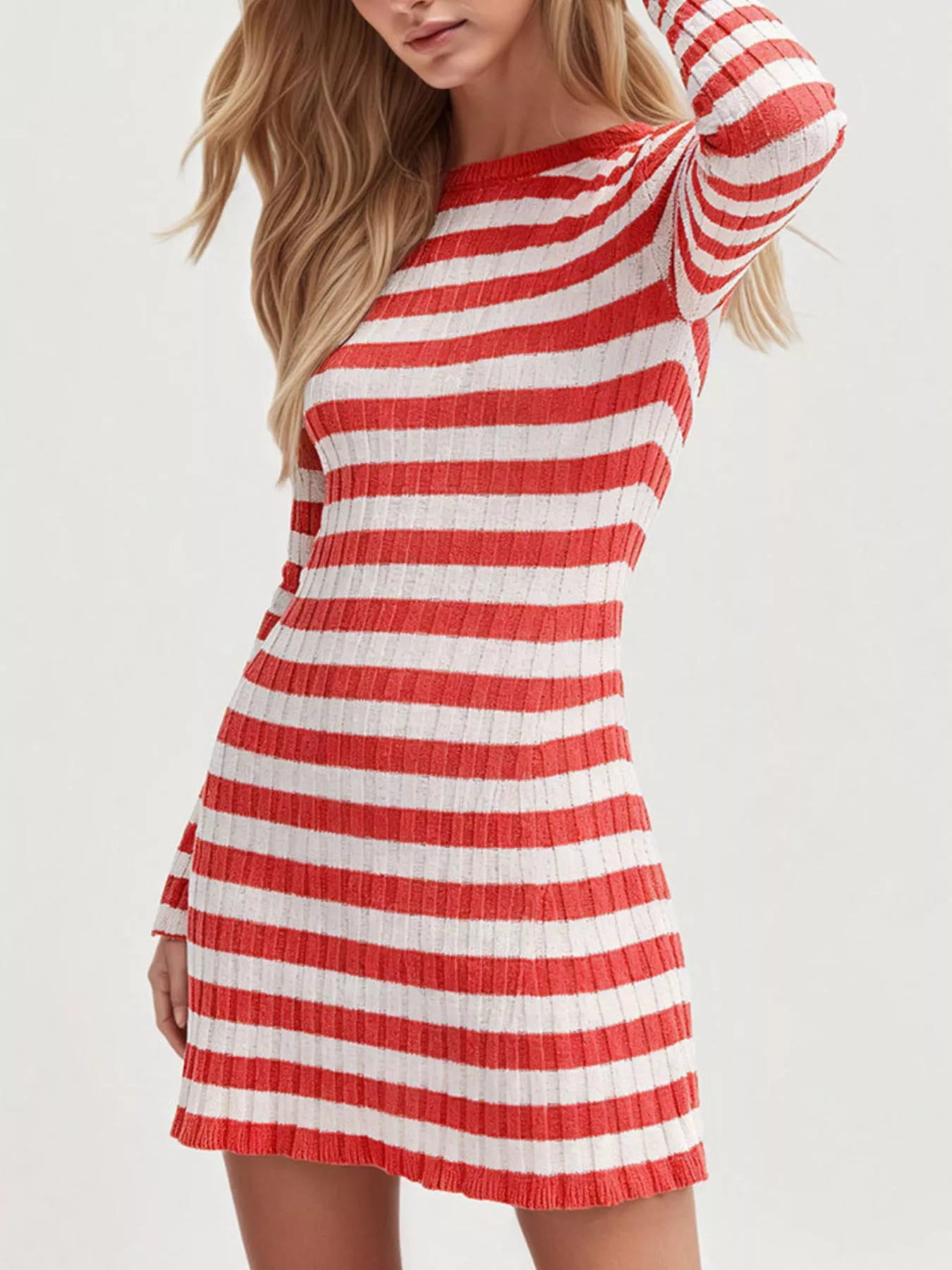 Red striped ribbed knit long sleeve sweater dress in a three quarter front view