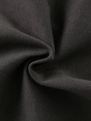 Close-up texture of the soft dark gray fabric of the children's short sleeve shirt