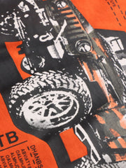 Close view of the off road vehicle wheel and grille detail on the children's t-shirt