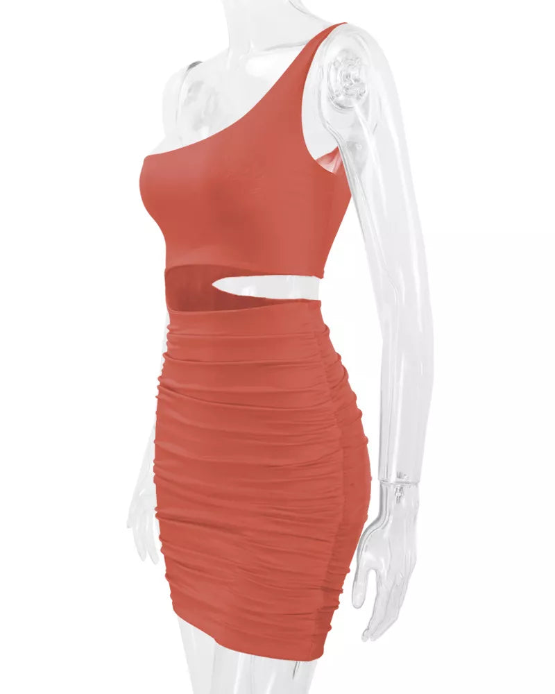 Orange powder one shoulder cutout ruched bodycon mini dress on a clear mannequin side view