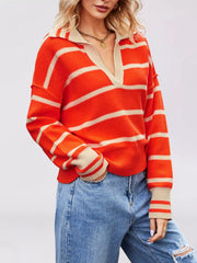 Angled on-model front view of orange red striped sweater with beige Johnny collar and dropped shoulders