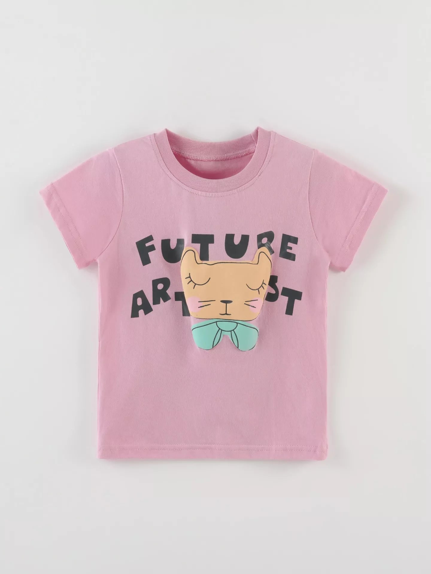 Pink children's short sleeve T-shirt laid flat with a cat face, mint bow and Future Artist lettering