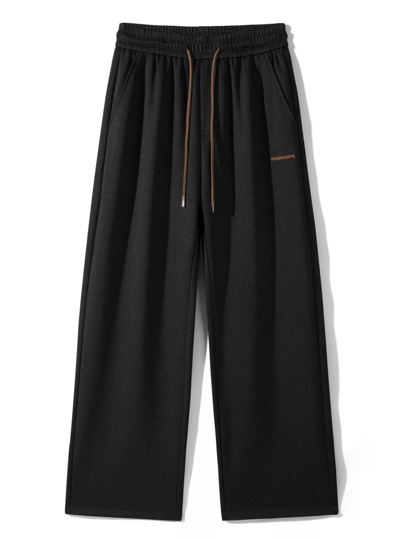 Men's loose fit casual pants with a drawstring waist and pockets.