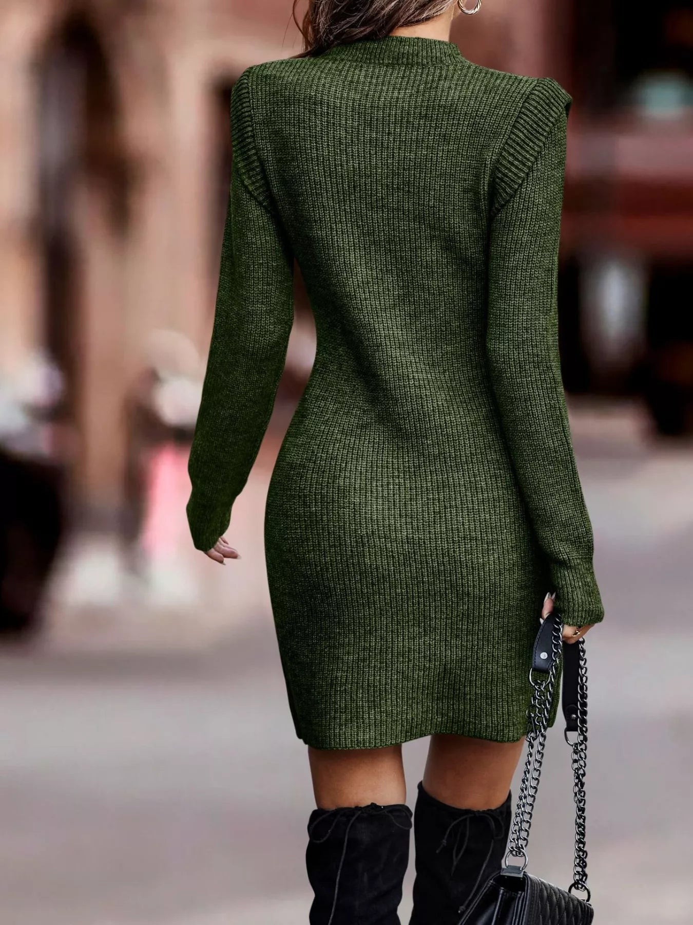 Back street view of dark green ribbed knit long sleeve bodycon sweater dress