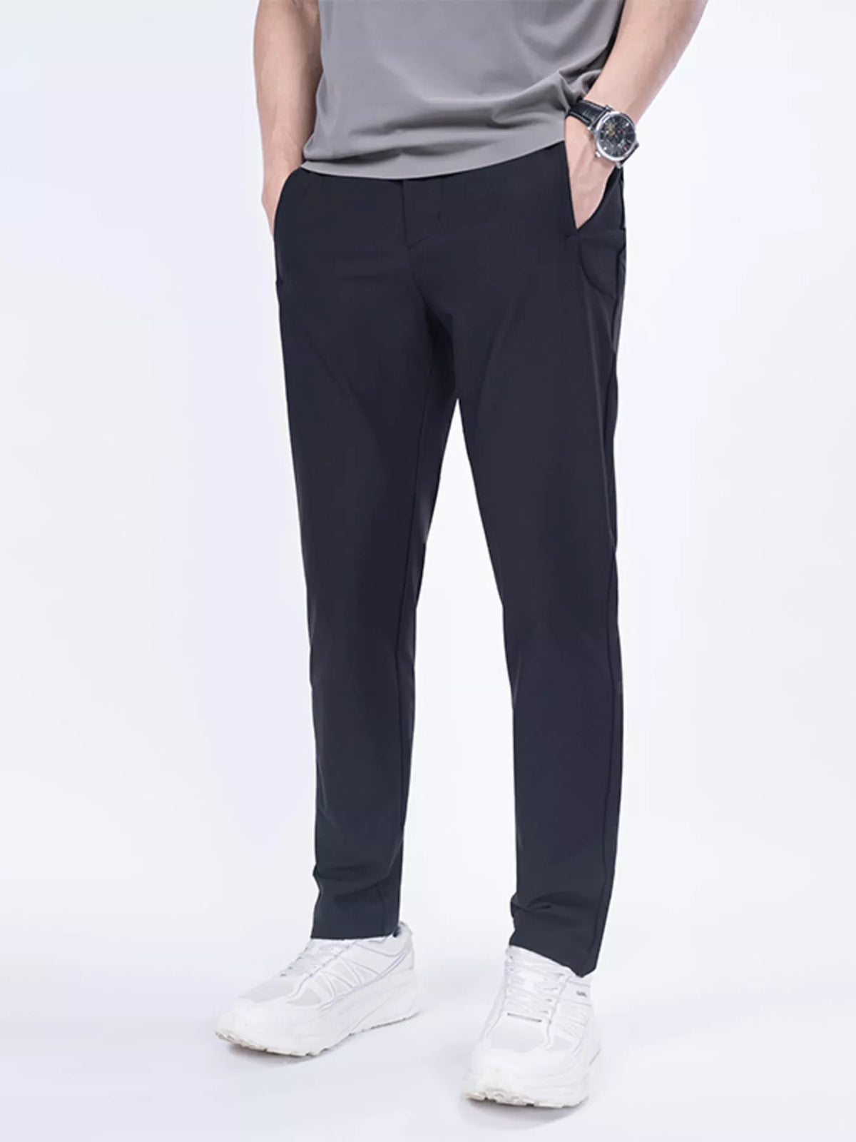 Men's black slim-fit casual pants with pockets, available in plus sizes.