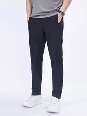 Men's black slim-fit casual pants with pockets, available in plus sizes.
