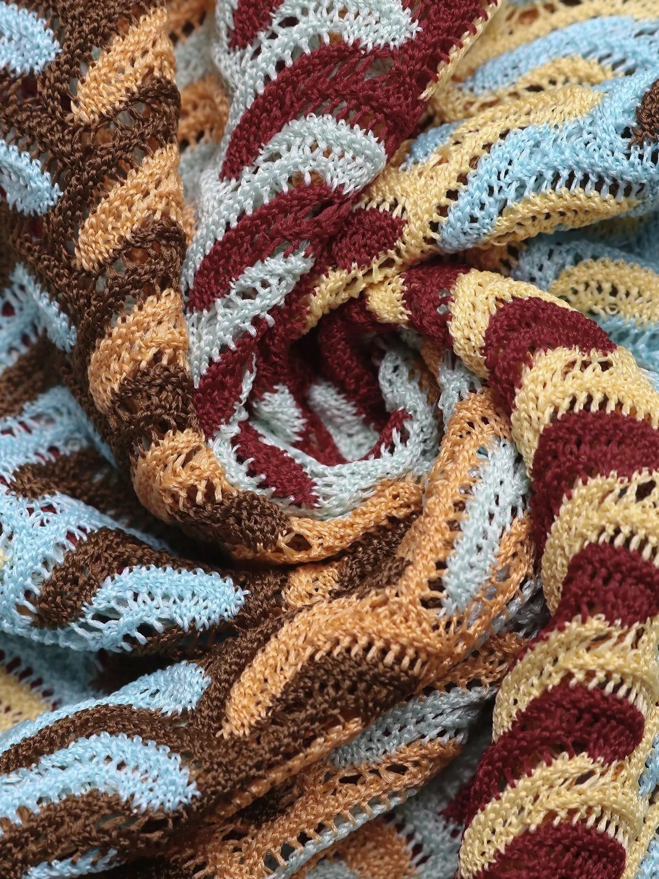 Close view of khaki striped crochet knit fabric texture of midi dress