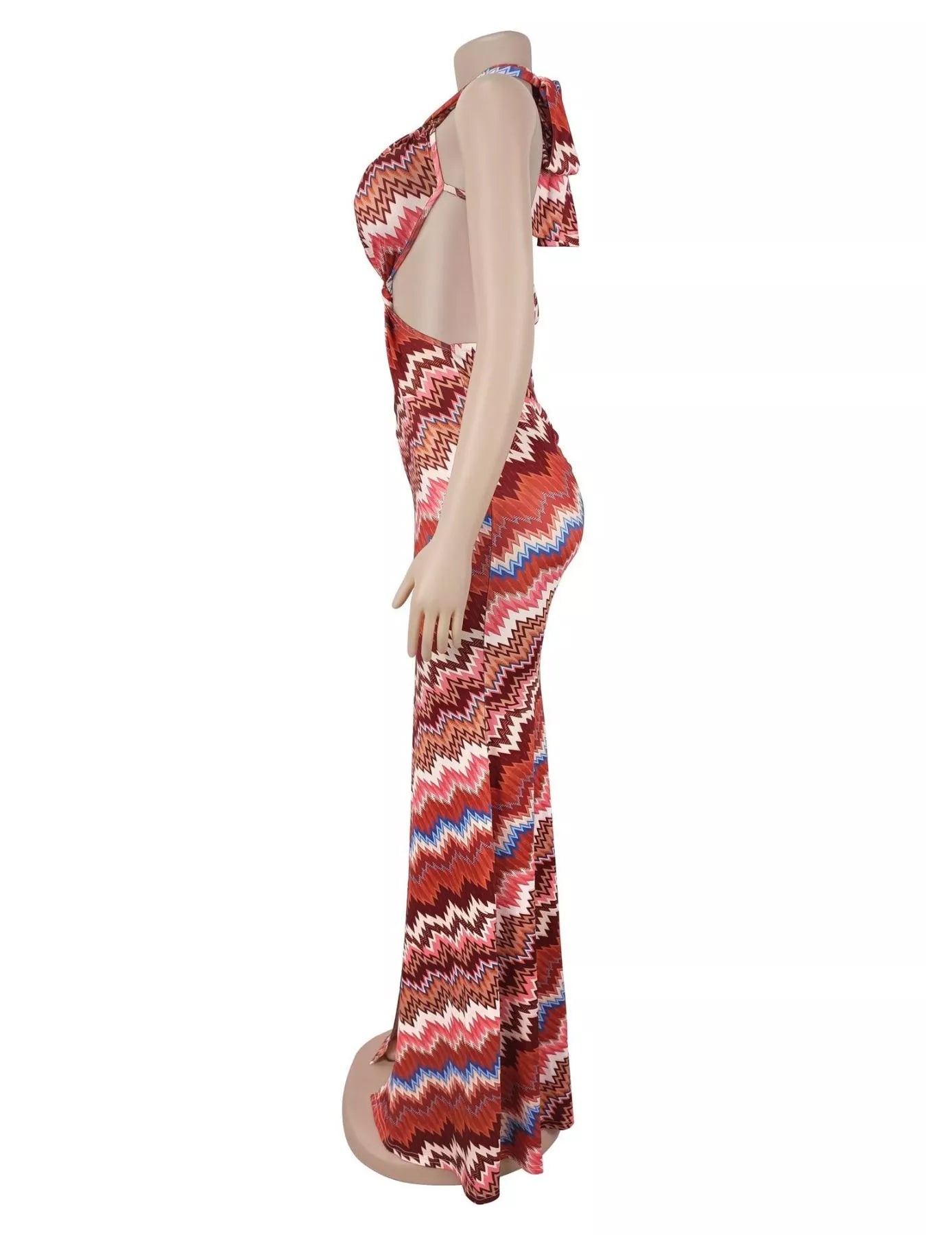 Side view of rust chevron halter maxi dress on a mannequin showing tied halter neck