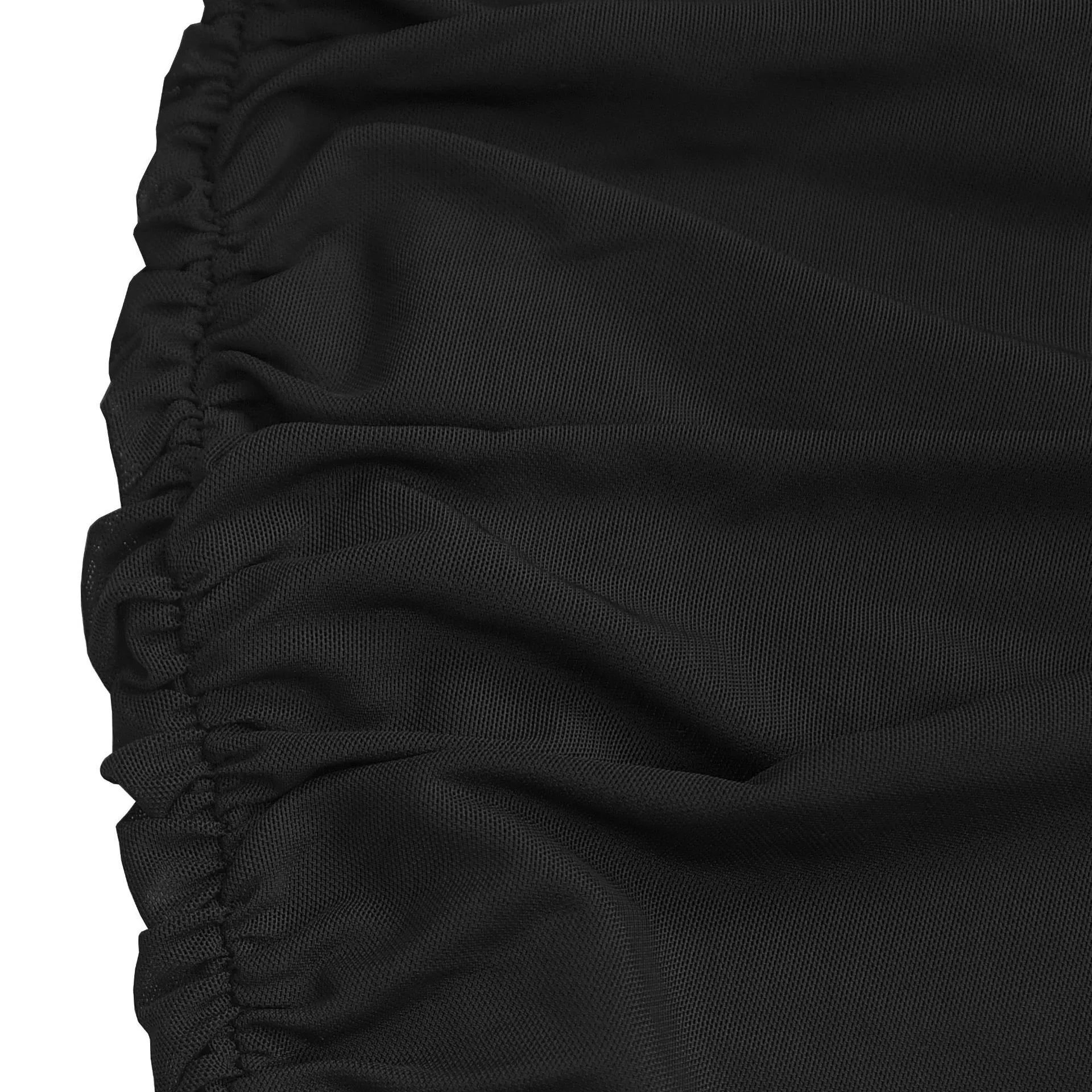 Close up of black ruched side seam and mesh fabric texture on maxi dress